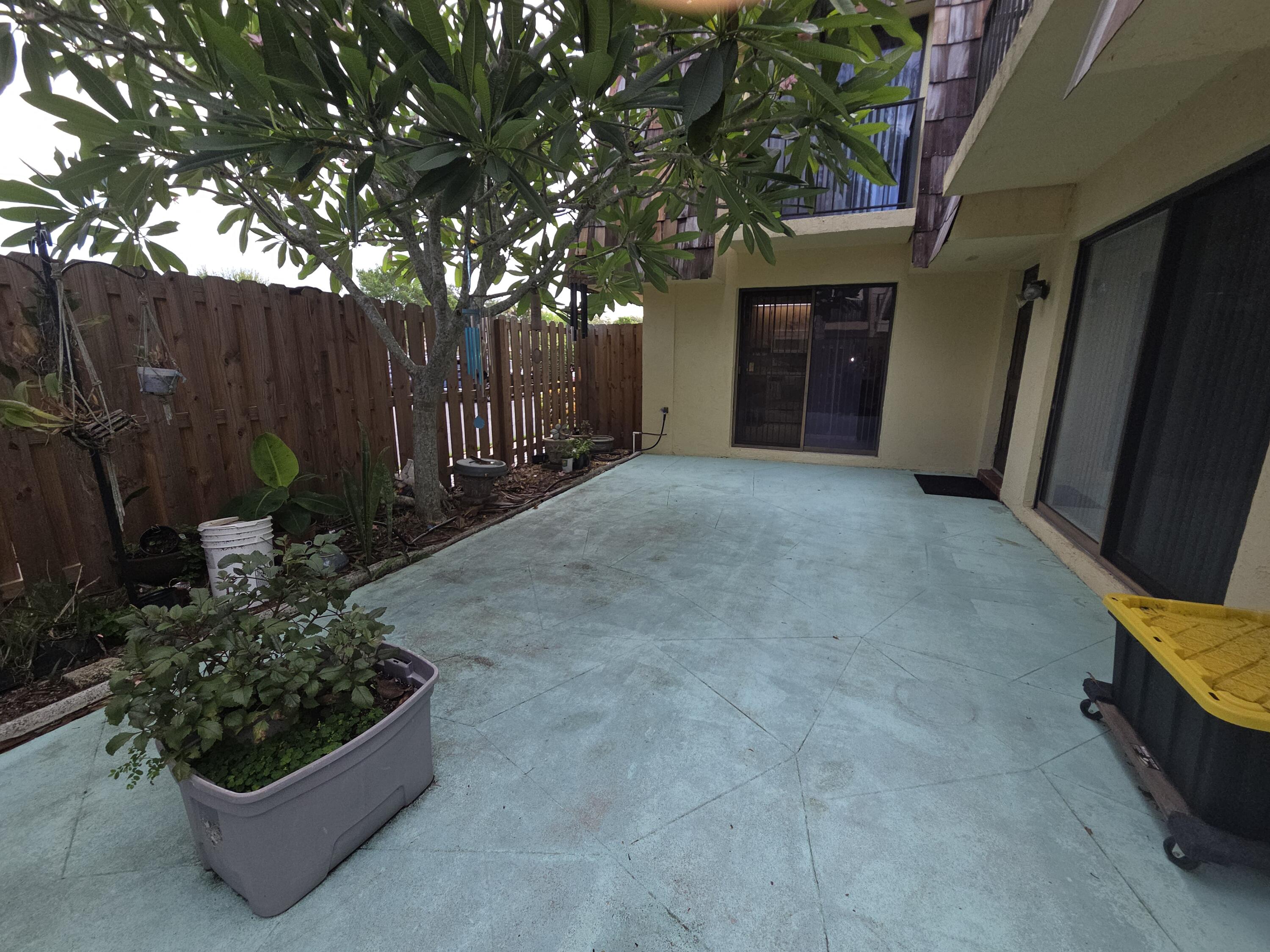 1170 6th Avenue, Unit 3A Vero Beach, FL 32960 - Photo 5 of 31 a view of a wooden door and bench in a room