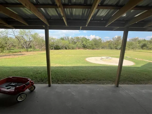 a view of a car in front of a house