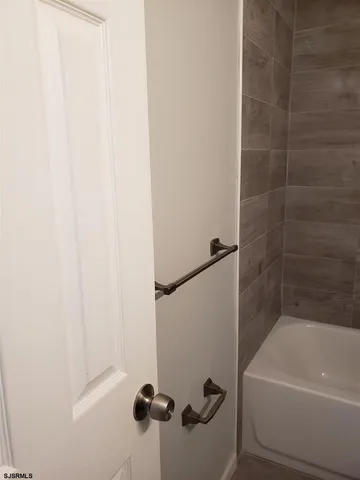 a bathroom with a bathtub
