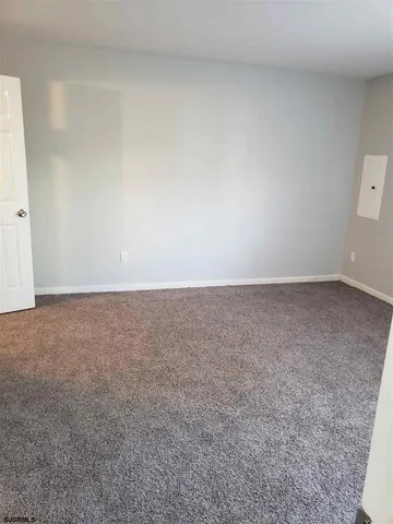 an empty room with an entryway