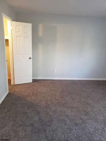 an empty room with an entryway