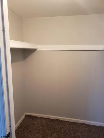 a view of small space with racks on the wall