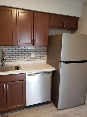 a utility room with washer and dryer