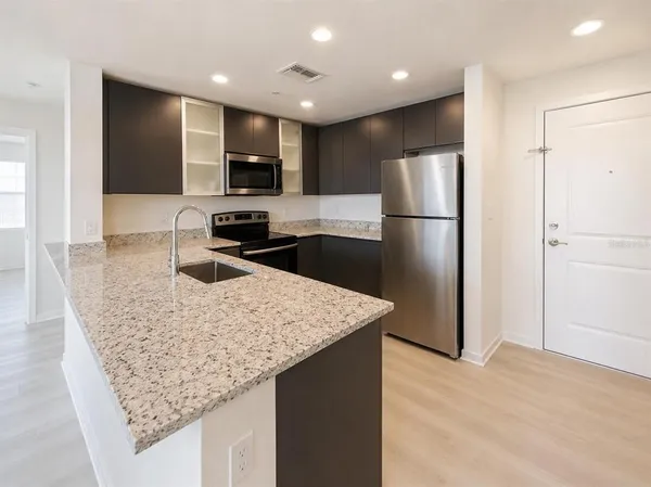 $1,800 | 5587 Millennia Park Drive, Unit 424, Orlando, FL 32839