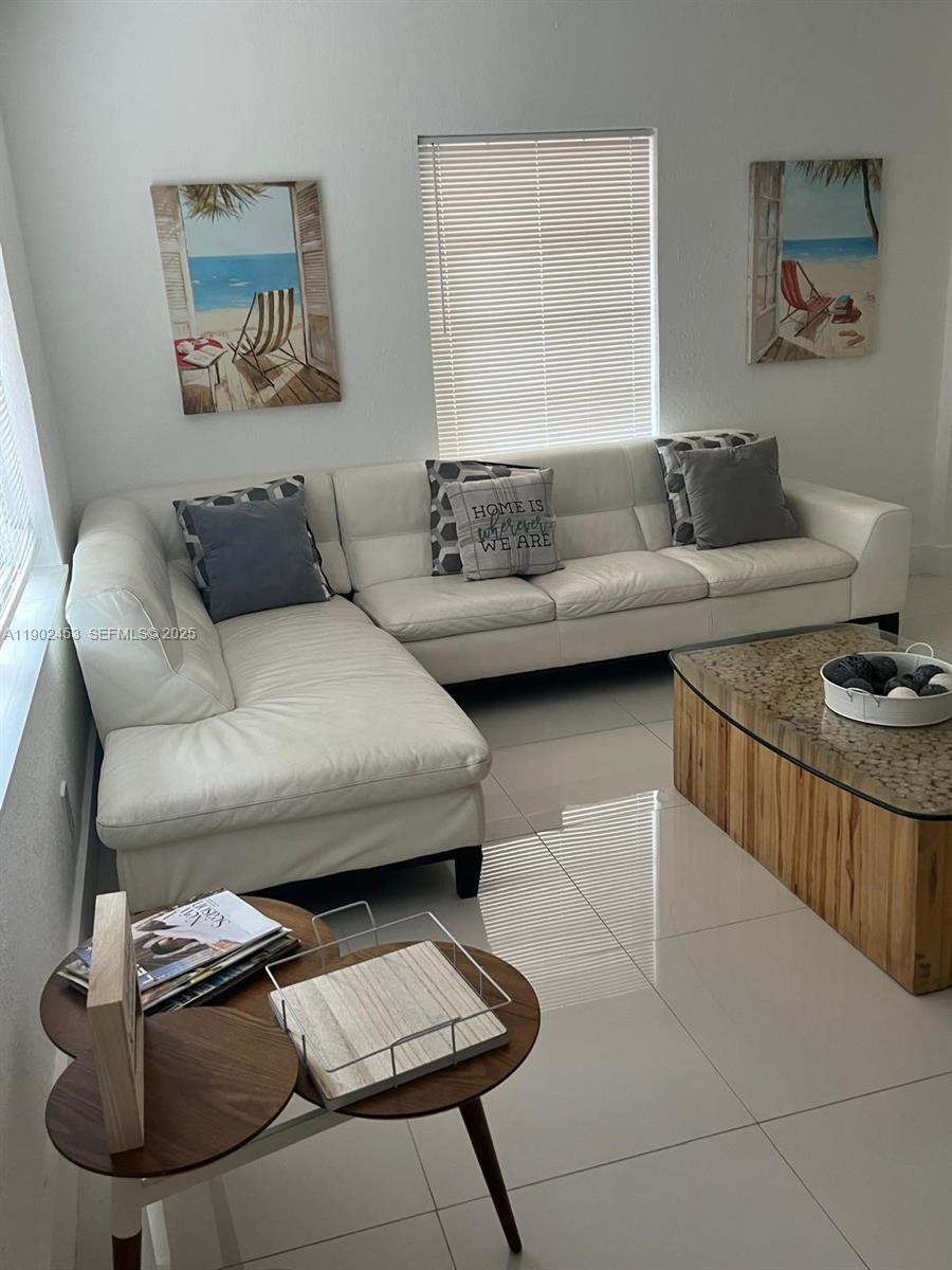 351 East 35th Street Hialeah, FL 33013 - Photo 4 of 4 a living room with furniture