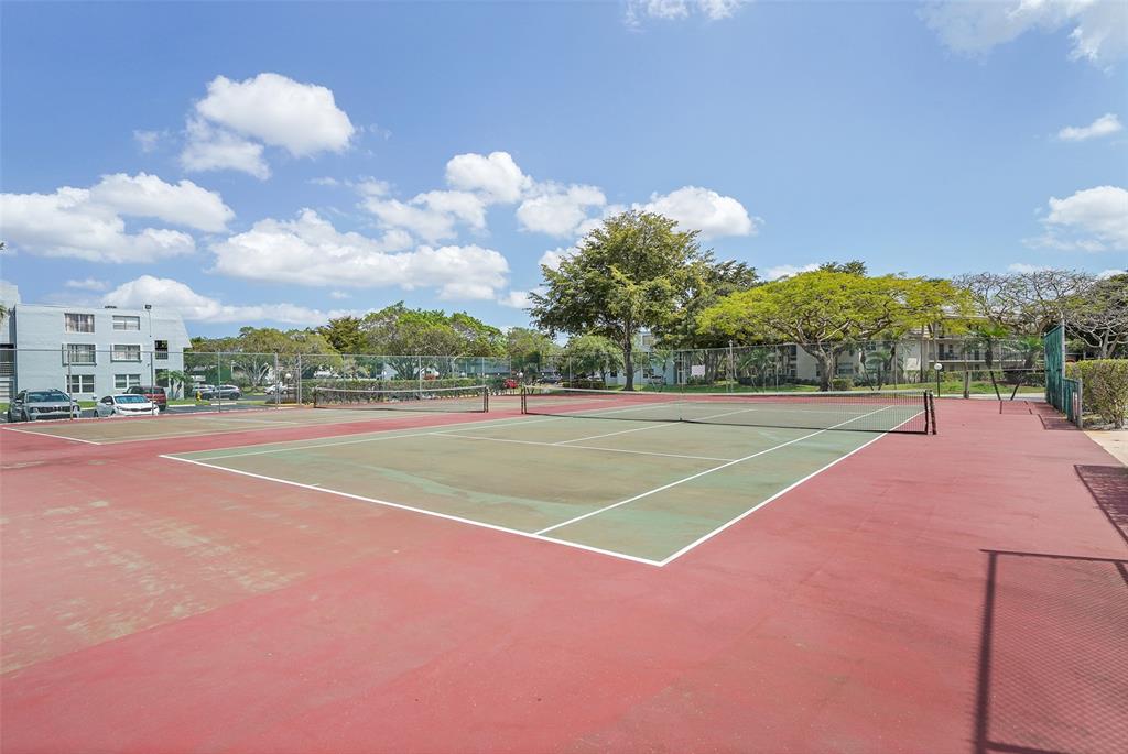 9090 Lime Bay Boulevard, Unit 112 Tamarac, FL 33321 - Photo 37 of 55 a view of a basket ball ground