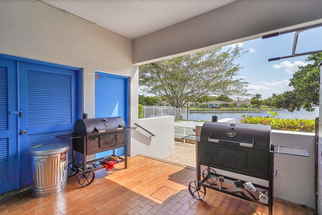 9090 Lime Bay Boulevard, Unit 112 Tamarac, FL 33321 - Photo 39 of 55 a room with furniture pool table and chair