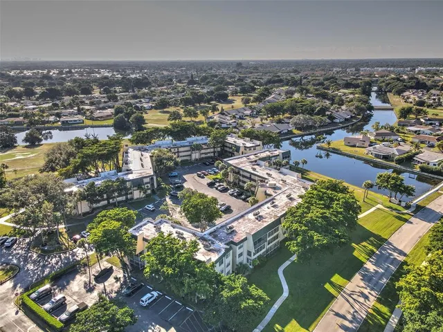 an aerial view of a house with a garden
