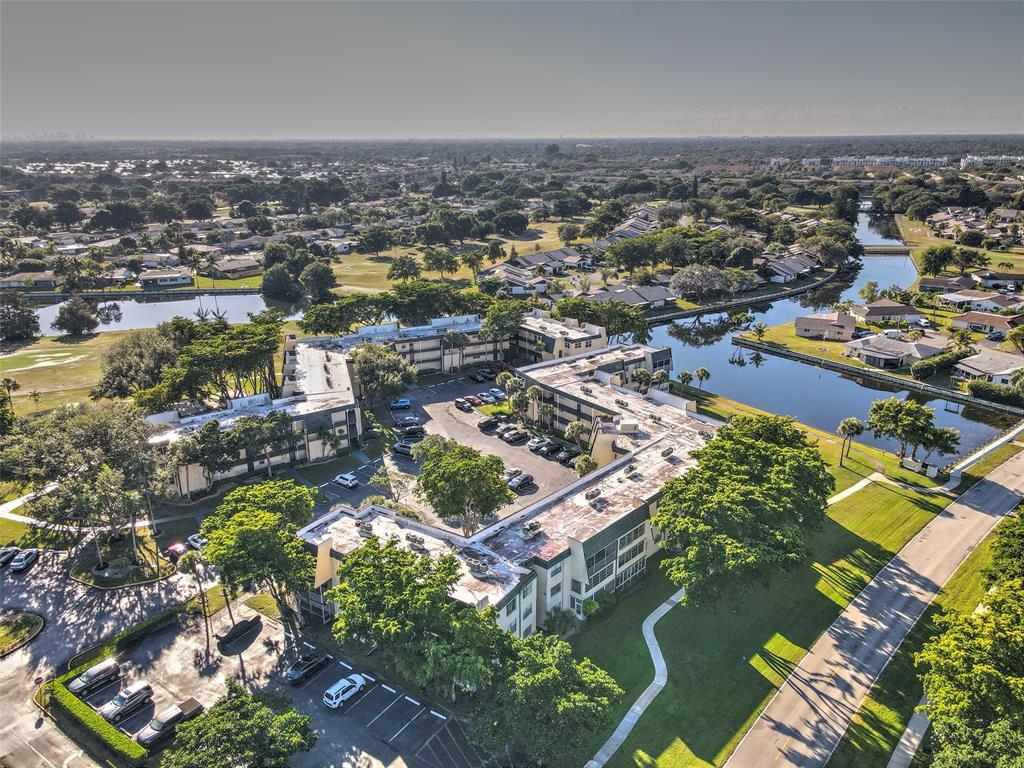9090 Lime Bay Boulevard, Unit 112 Tamarac, FL 33321 - Photo 44 of 55 an aerial view of residential houses with outdoor space