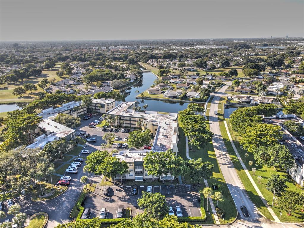 9090 Lime Bay Boulevard, Unit 112 Tamarac, FL 33321 - Photo 45 of 55 an aerial view of multiple house