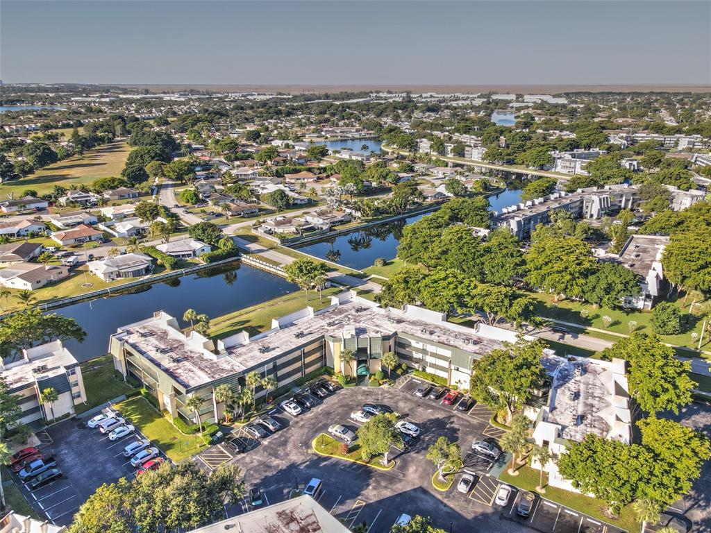 9090 Lime Bay Boulevard, Unit 112 Tamarac, FL 33321 - Photo 47 of 55 an aerial view of residential houses with outdoor space