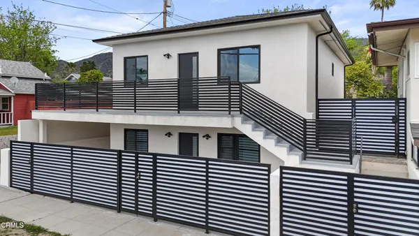 a view of a house with a white door