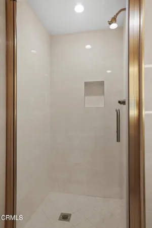 an aerial view of a house with yard swimming pool and outdoor seating