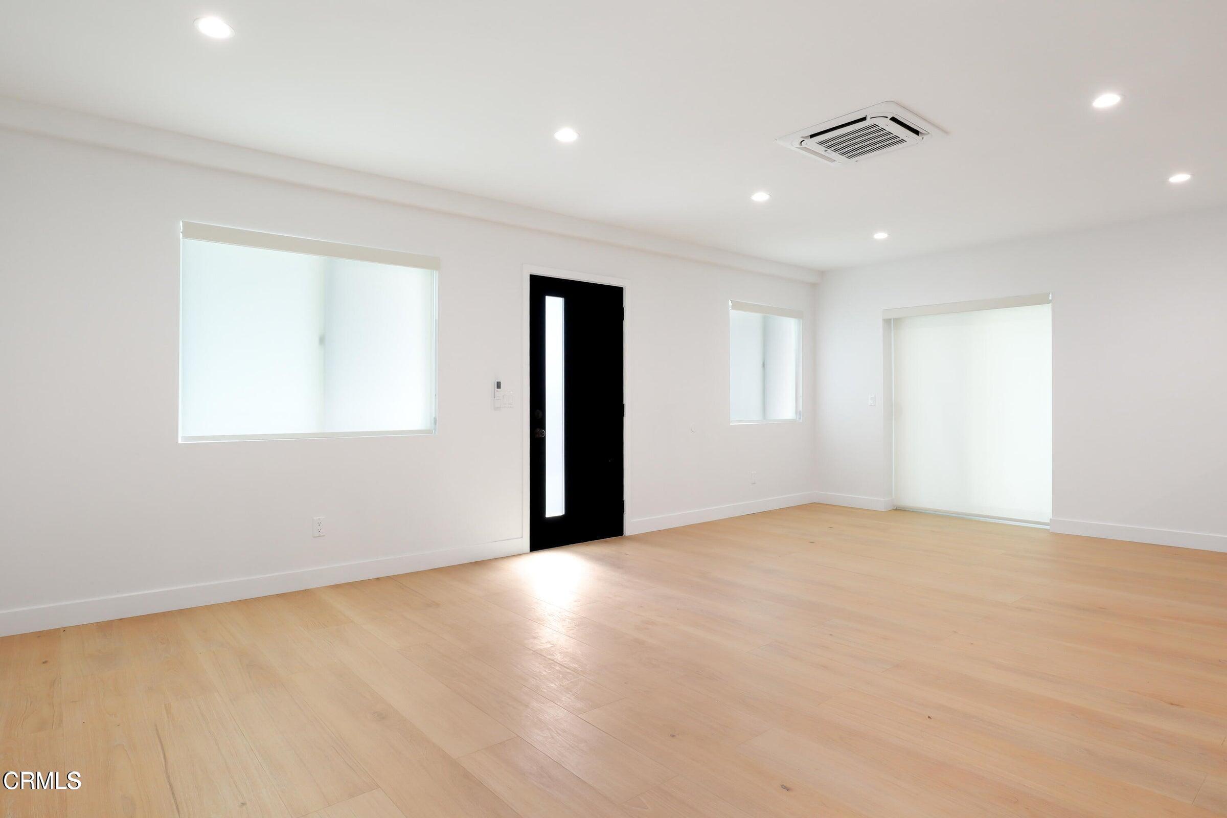 112 North Kenneth Road, Unit 101 Burbank, CA 91501 - Photo 5 of 20 a view of an empty room with a window