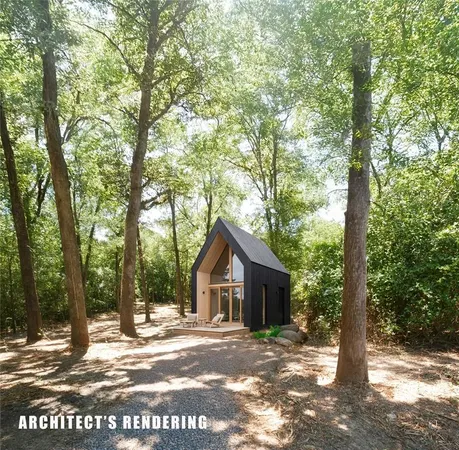 a wooden house with trees in front of it