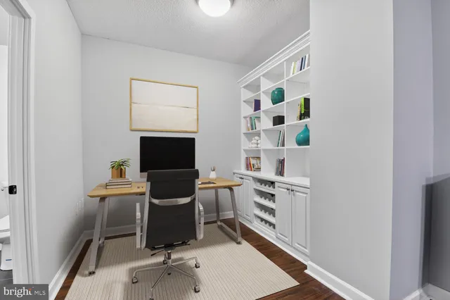 a room with furniture and white walls