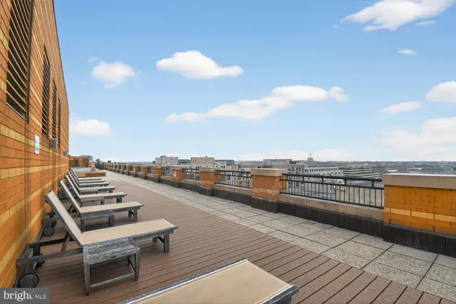 a view of a terrace with sitting area