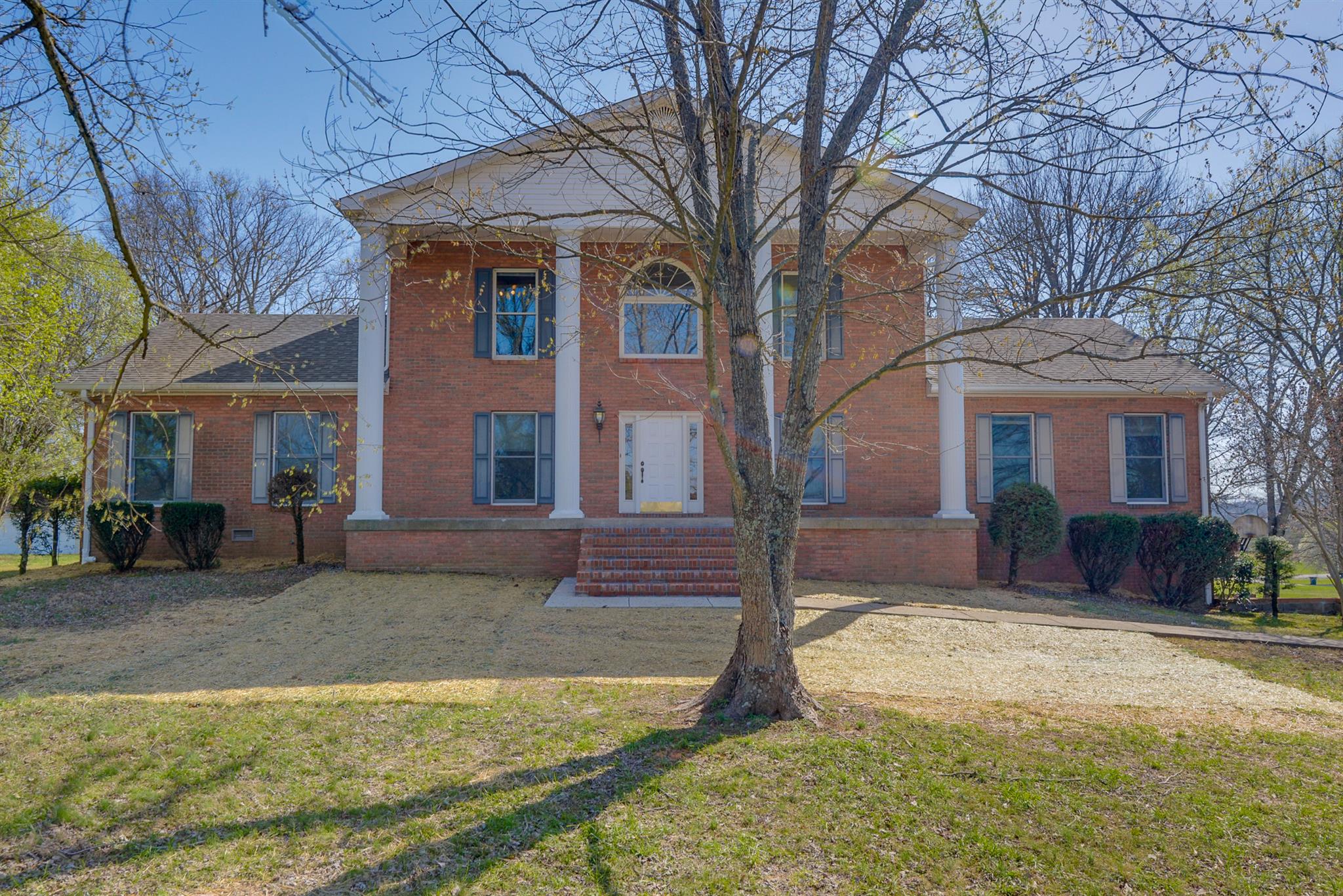 320 Goshen Road Lebanon, TN 37087 - Photo 1 of 28 a view of a house with a yard and large tree