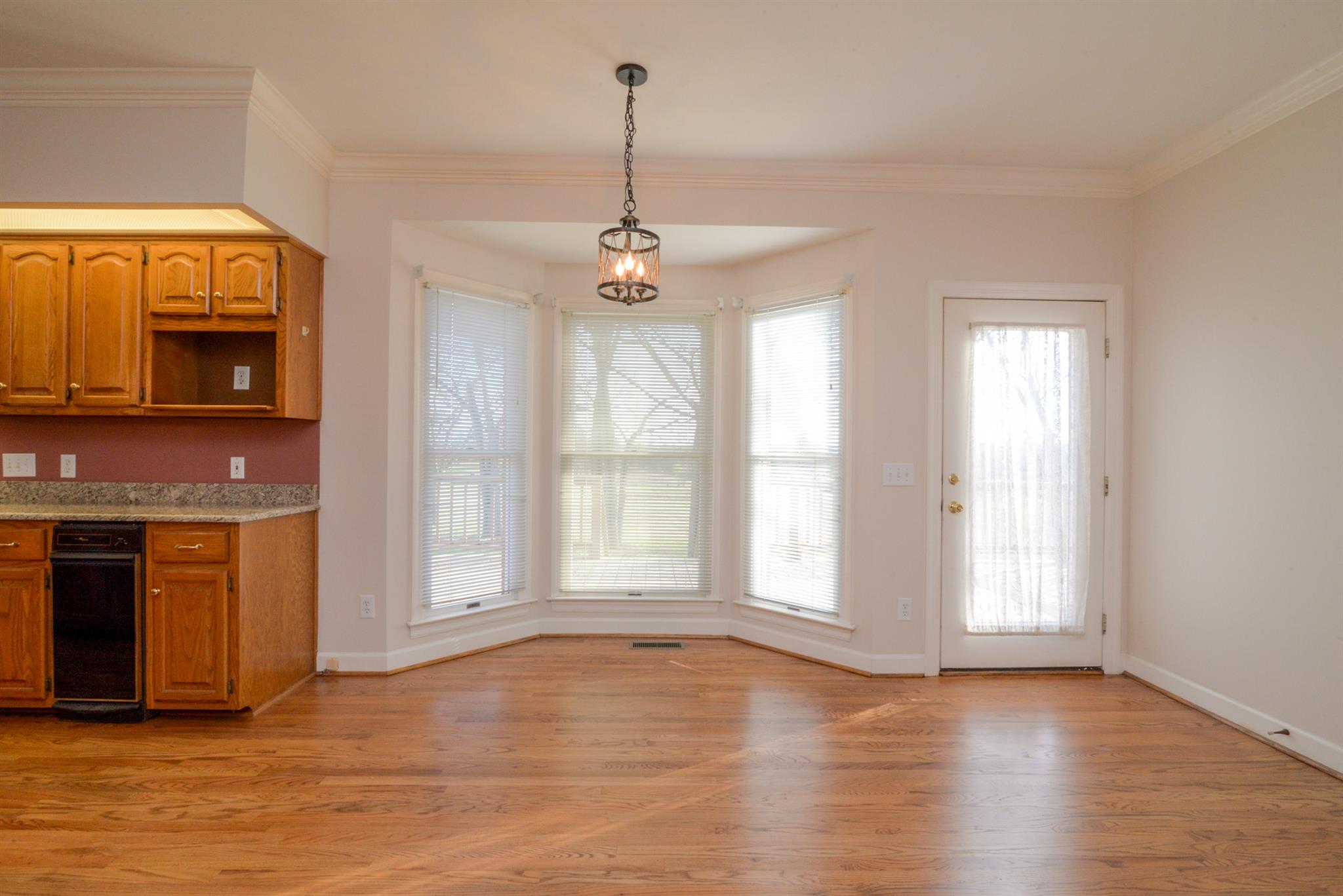 320 Goshen Road Lebanon, TN 37087 - Photo 17 of 28 a view of an empty room with a fireplace and a window