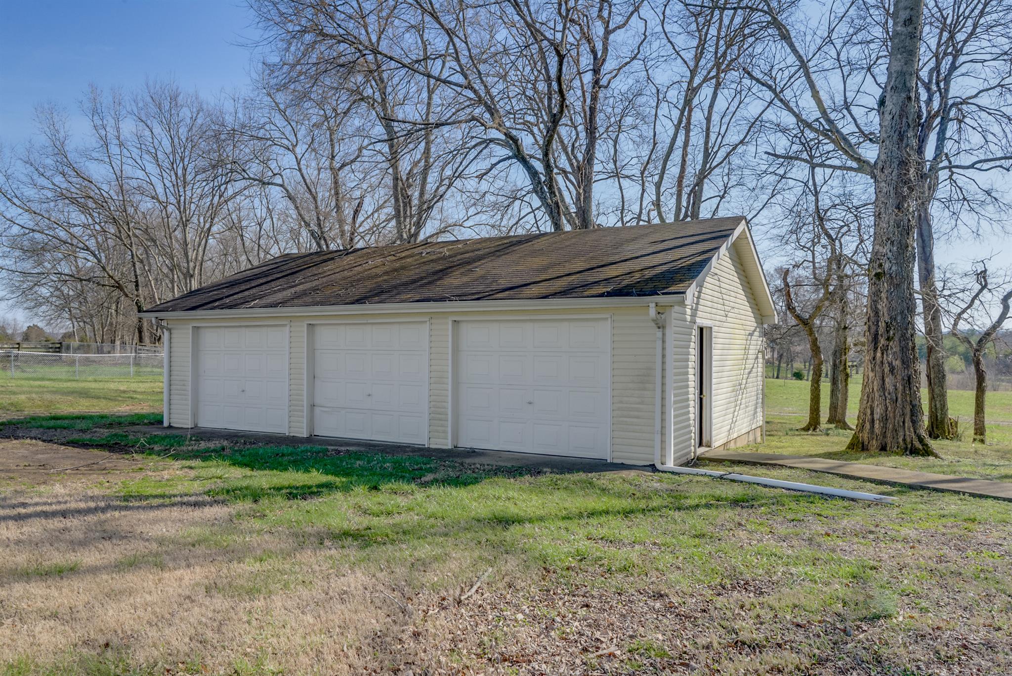 320 Goshen Road Lebanon, TN 37087 - Photo 5 of 28 a front view of a house with a garden