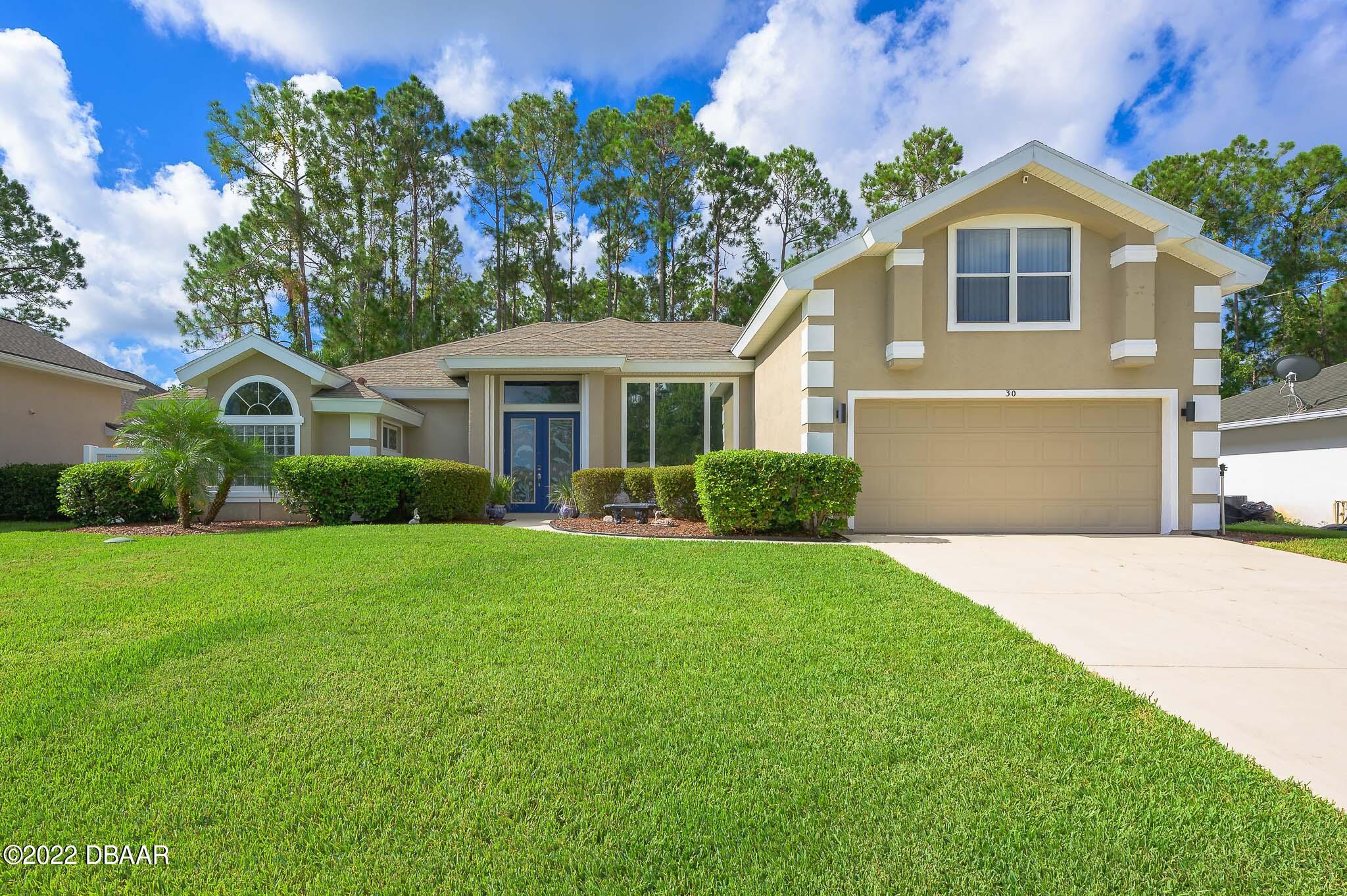 30 Raleigh Drive Palm Coast, FL 32164 - Photo 1 of 47 Front