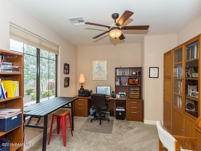 1636 Constable Street Prescott, AZ 86301 - Photo 19 of 33 a workspace with a bookshelf