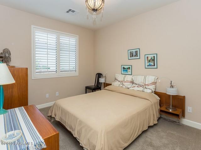 1636 Constable Street Prescott, AZ 86301 - Photo 21 of 33 a bedroom with bed and a window