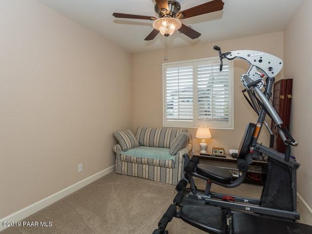 1636 Constable Street Prescott, AZ 86301 - Photo 23 of 33 a living room with furniture a air conditioner and a window