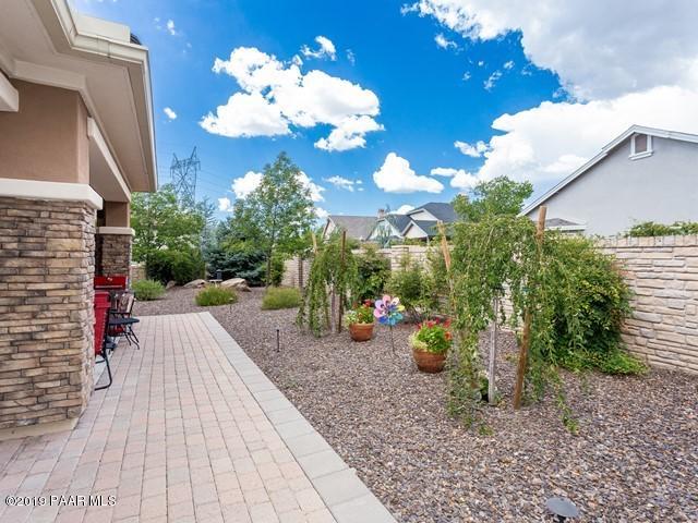 1636 Constable Street Prescott, AZ 86301 - Photo 30 of 33 a view of a house with a backyard