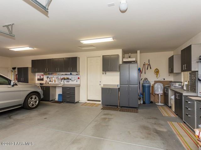 1636 Constable Street Prescott, AZ 86301 - Photo 32 of 33 a view of a kitchen with a sink and a stove top oven