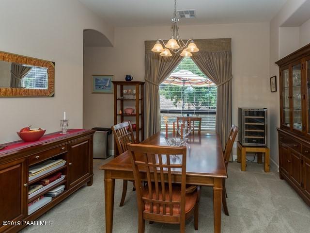 1636 Constable Street Prescott, AZ 86301 - Photo 10 of 33 a dining room with furniture a chandelier and window