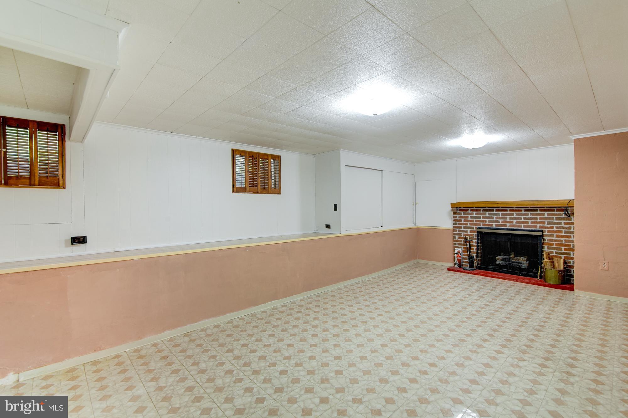 1867 Griffith Road Falls Church, VA 22043 - Photo 15 of 23 Lower level Rec room w/fireplace