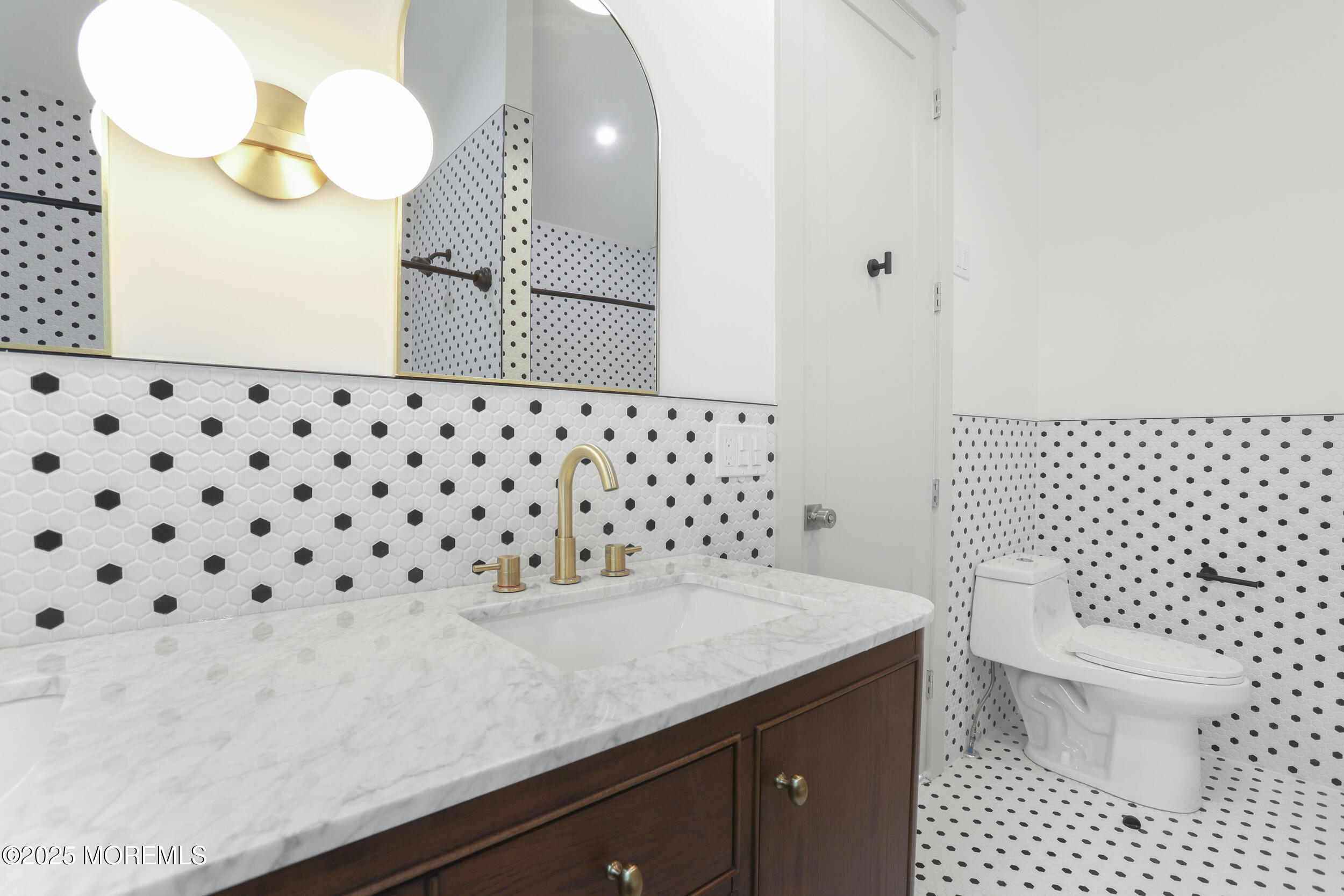 1405 Ridge Avenue Jackson, NJ 08527 - Photo 12 of 29 a bathroom with a sink a toilet a mirror and shower