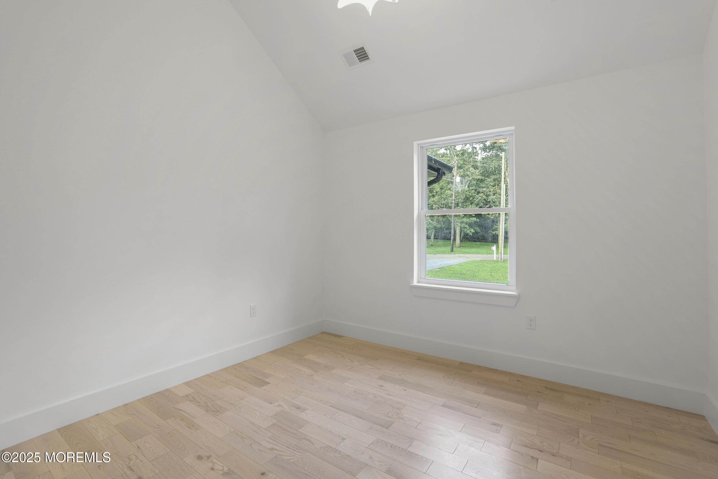 1405 Ridge Avenue Jackson, NJ 08527 - Photo 7 of 29 an empty room with a window