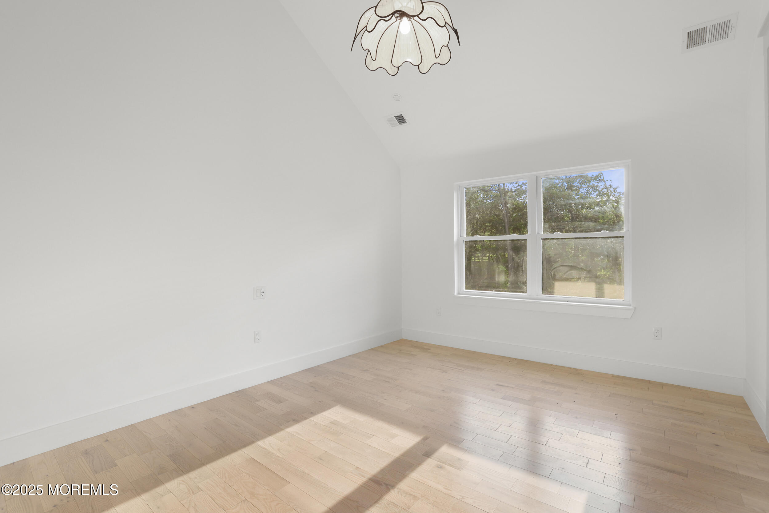 1405 Ridge Avenue Jackson, NJ 08527 - Photo 10 of 29 an empty room with a window