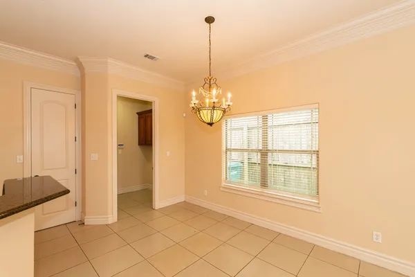 a view of a room with windows