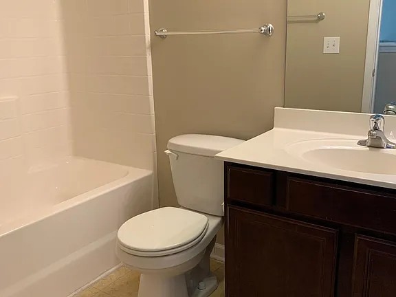 2015 Lavender Court Spring Hill, TN 37174 - Photo 15 of 23 a bathroom with a sink a toilet and shower