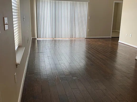 2015 Lavender Court Spring Hill, TN 37174 - Photo 17 of 23 an empty room with wooden floor and windows