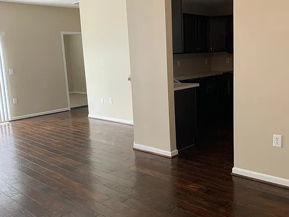 2015 Lavender Court Spring Hill, TN 37174 - Photo 18 of 23 an empty room with wooden floor and closet