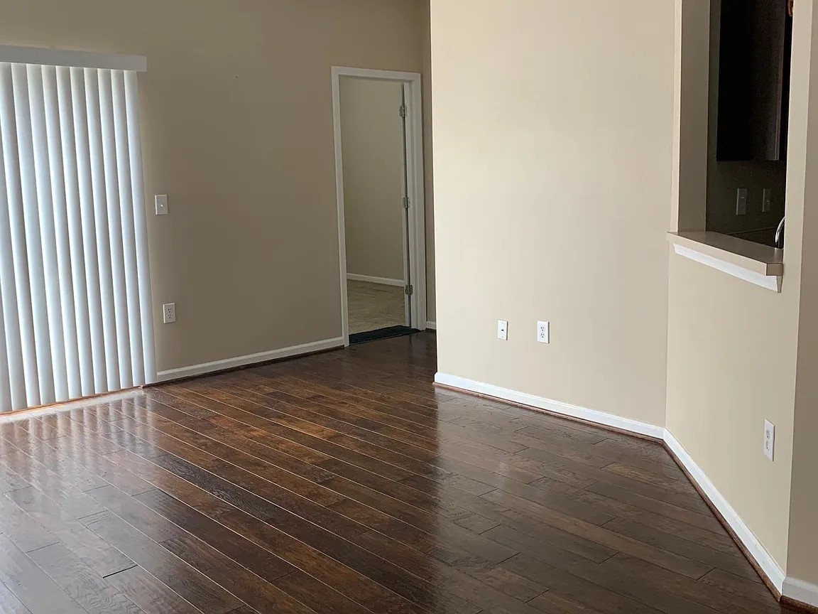 2015 Lavender Court Spring Hill, TN 37174 - Photo 19 of 23 an empty room with wooden floor and windows