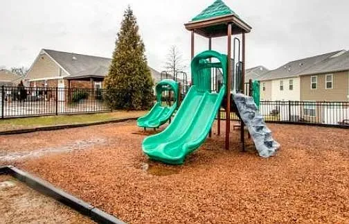 a view of a house with a park