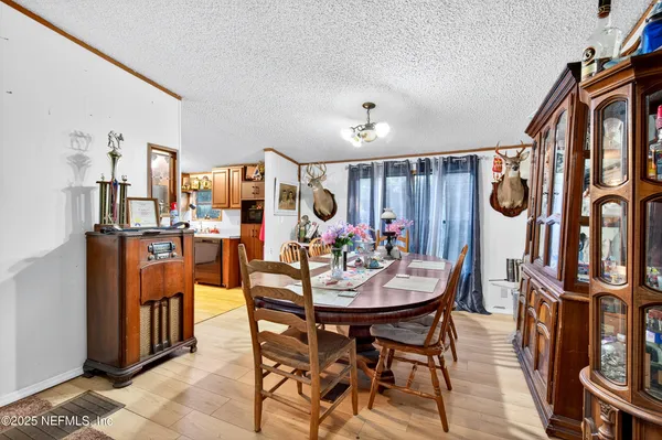 a kitchen with stainless steel appliances kitchen island granite countertop a sink and cabinets