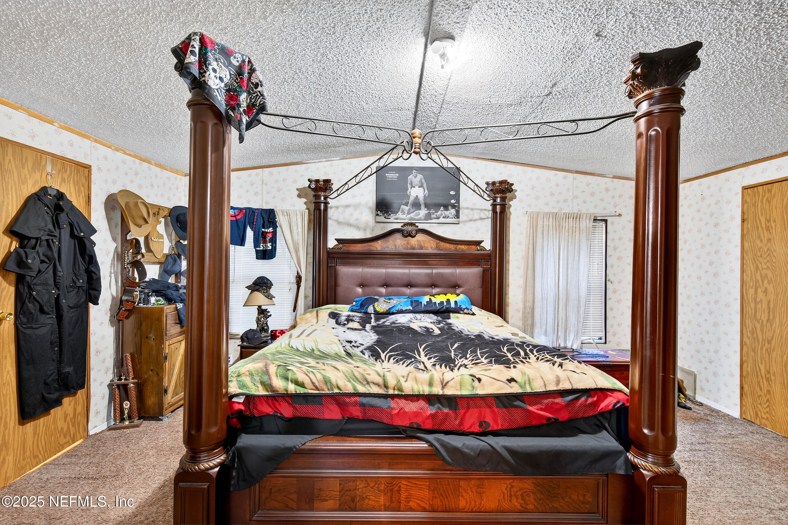 133 Rainbow Road Crescent City, FL 32112 - Photo 24 of 31 a bedroom with bed and a mirror