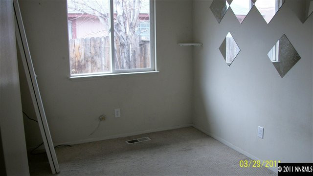 1318 Butler Street Reno, NV 89512 - Photo 9 of 13 an empty room with windows