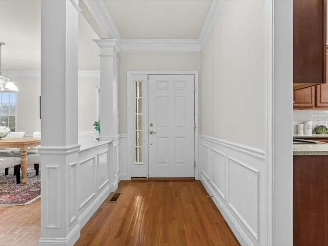 a view of a kitchen from the hallway
