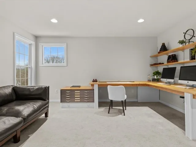 a bedroom with furniture and a couch