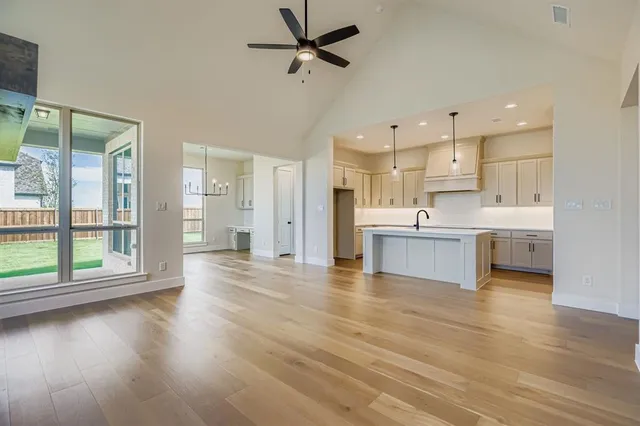 a view of kitchen with wooden floor and window