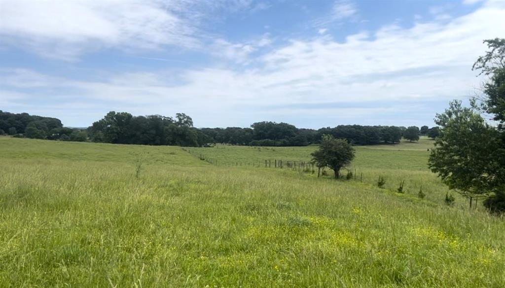 Lot 4 Hunts Gin Road Calhoun, GA 30701 - Photo 11 of 16 a view of a lake with houses in the back