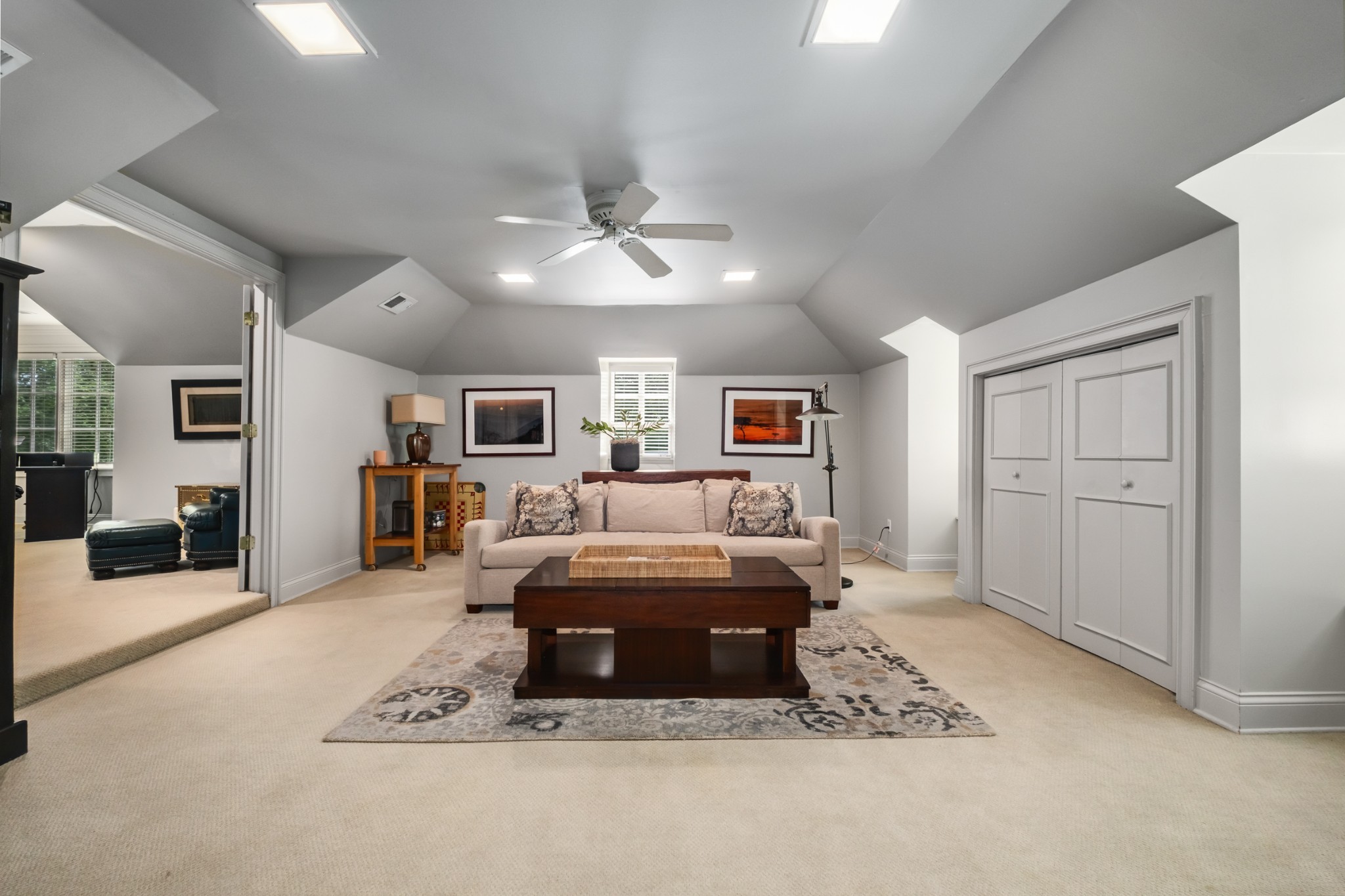 140 Brook Hollow Road Nashville, TN 37205 - Photo 23 of 31 a living room with furniture a fireplace and a flat screen tv