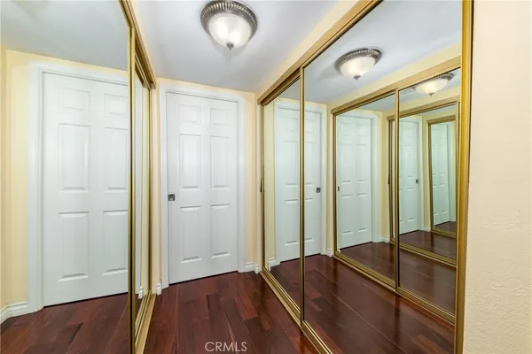 a kitchen with a stove sink and cabinets
